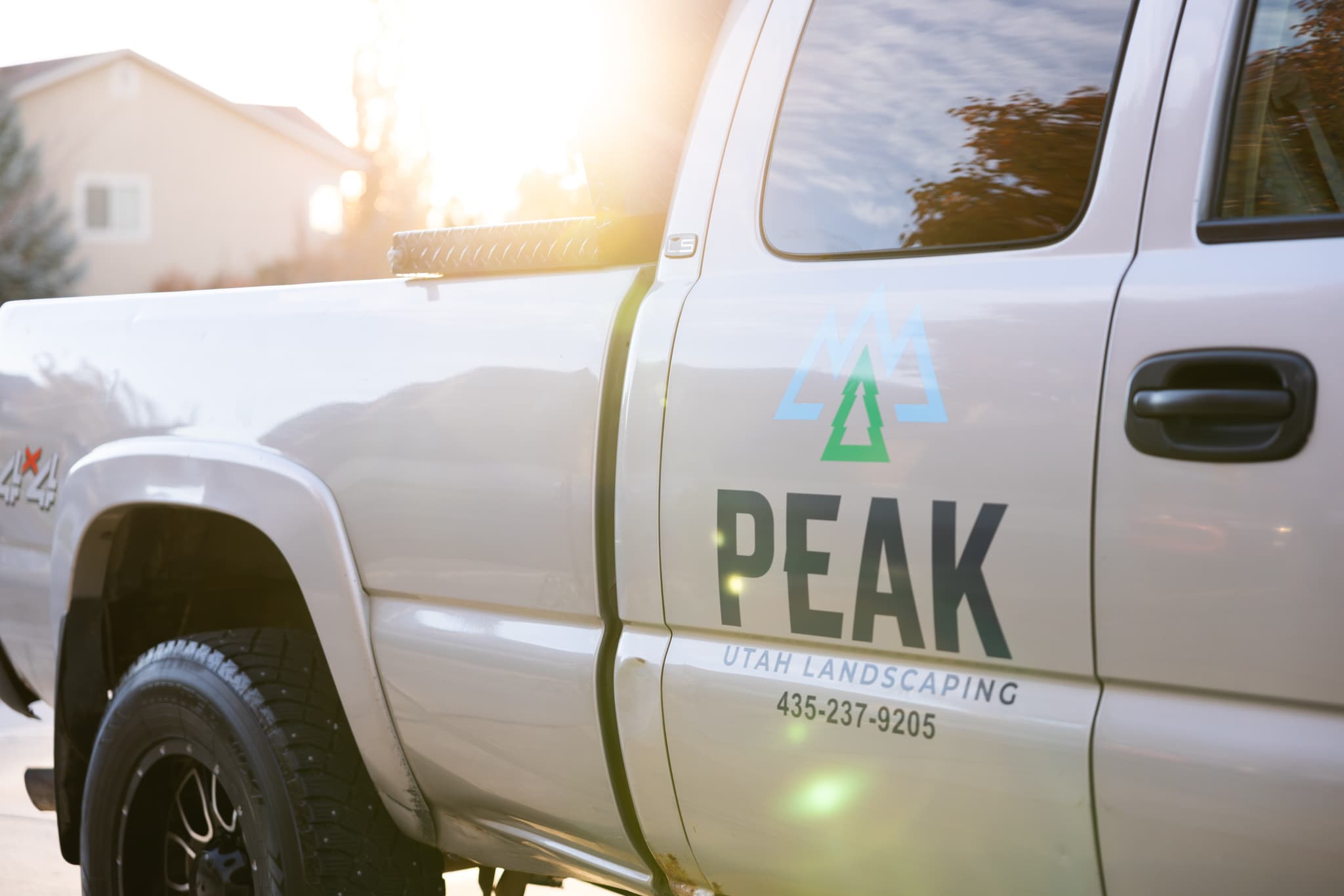 Peak Utah Landscaping truck on job site